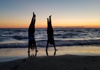 Image of kids doing a handstand