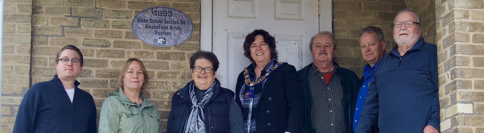 Photo of plaque unveiling at Elsinore Community Centre